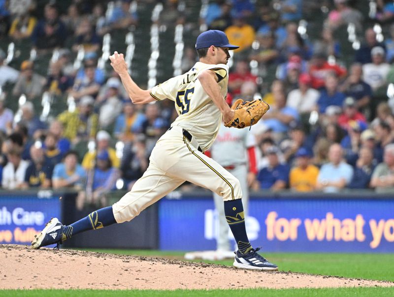 Sep 16, 2024; Milwaukee, Wisconsin, USA; Milwaukee Brewers pitcher Hoby Milner (55) delivers a pitch against the Philadelphia Phillies in the seventh inning at American Family Field. Mandatory Credit: Michael McLoone-Imagn Images