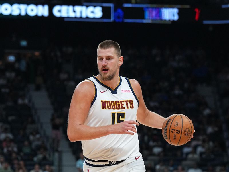 ABU DHABI, UAE - OCTOBER 4: Nikola Jokic #15 of the Denver Nuggets dribbles the ball during the game against the Boston Celtics during the 2024 Global Games on October 4, 2024 at the Etihad Arena in Abu Dhabi, United Arab Emirates. NOTE TO USER: User expressly acknowledges and agrees that, by downloading and/or using this Photograph, user is consenting to the terms and conditions of the Getty Images License Agreement. Mandatory Copyright Notice: Copyright 2024 NBAE (Photo by Garrett Ellwood/NBAE via Getty Images)