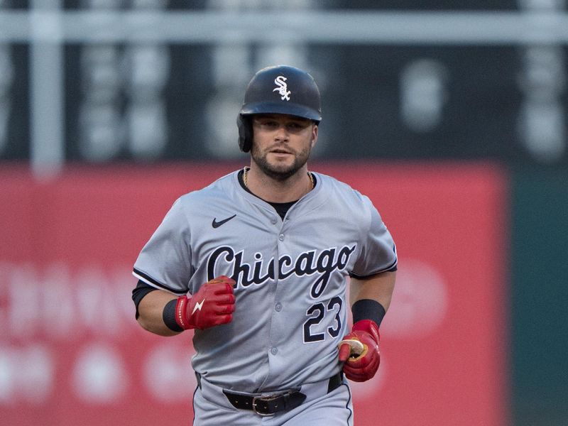 Aug 6, 2024; Oakland, California, USA;  Chicago White Sox outfielder Andrew Benintendi (23) runs the bases after hitting a two run home run during the fourth inning against the Oakland Athletics at Oakland-Alameda County Coliseum. Mandatory Credit: Stan Szeto-USA TODAY Sports