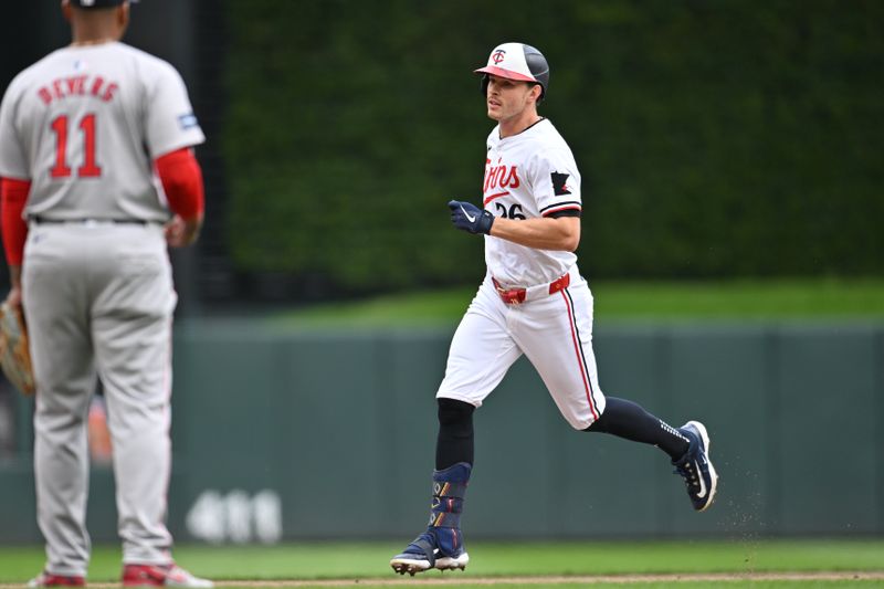 May 4, 2024; Minneapolis, Minnesota, USA; Minnesota Twins outfielder Max Kepler (26) rounds the bases after hitting a home run during the fourth inning against the Boston Red Sox at Target Field. Mandatory Credit: Jeffrey Becker-USA TODAY Sports