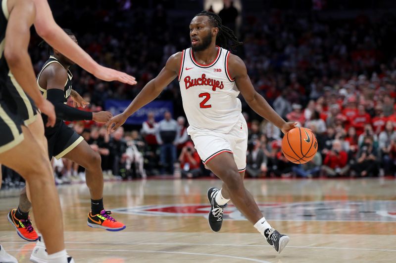 Feb 18, 2024; Columbus, Ohio, USA;  Ohio State Buckeyes guard Bruce Thornton (2) controls the ball as Purdue Boilermakers guard Ethan Morton (25) defends during the second half at Value City Arena. Mandatory Credit: Joseph Maiorana-USA TODAY Sports