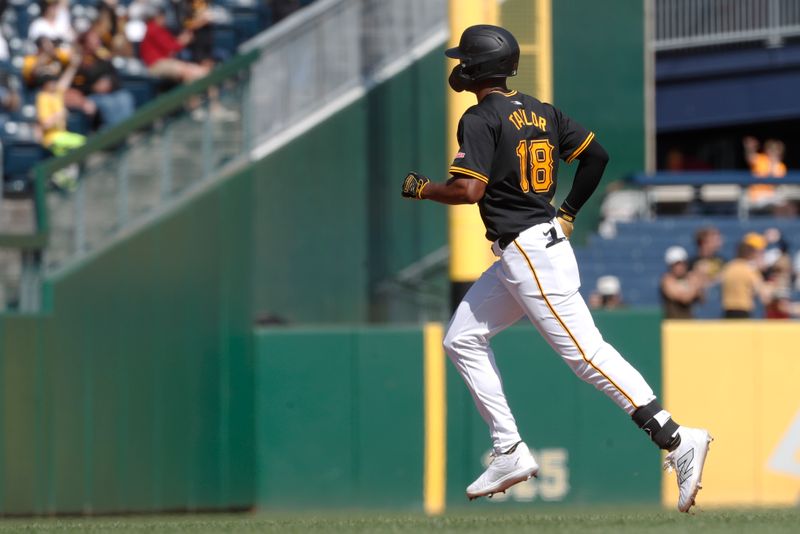 Sep 8, 2024; Pittsburgh, Pennsylvania, USA;  Pittsburgh Pirates center fielder Michael A. Taylor (18) circles the bases on a solo home run against the Washington Nationals during the sixth inning at PNC Park. Mandatory Credit: Charles LeClaire-Imagn Images