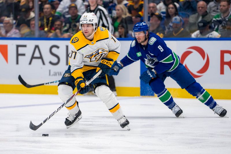 Apr 23, 2024; Vancouver, British Columbia, CAN; Nashville Predators forward Luke Evangelista (77) handles the puck against the Vancouver Canucks during the first period in game two of the first round of the 2024 Stanley Cup Playoffs at Rogers Arena. Mandatory Credit: Bob Frid-USA TODAY Sports