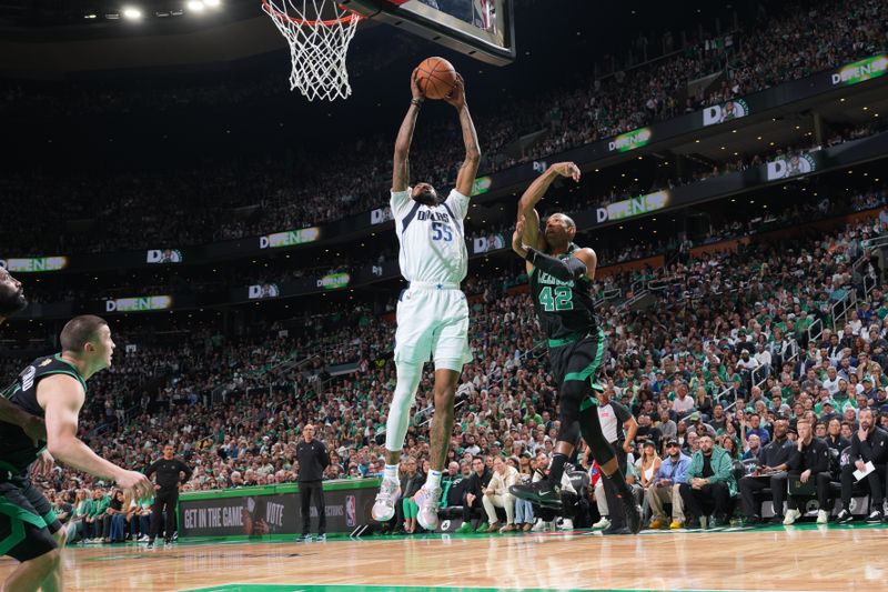 BOSTON, MA - JUNE 9: Derrick Jones Jr. #55 of the Dallas Mavericks drives to the basket during the game against the Boston Celtics during Game 2 of the 2024 NBA Finals on June 9, 2024 at the TD Garden in Boston, Massachusetts. NOTE TO USER: User expressly acknowledges and agrees that, by downloading and or using this photograph, User is consenting to the terms and conditions of the Getty Images License Agreement. Mandatory Copyright Notice: Copyright 2024 NBAE  (Photo by Jesse D. Garrabrant/NBAE via Getty Images)