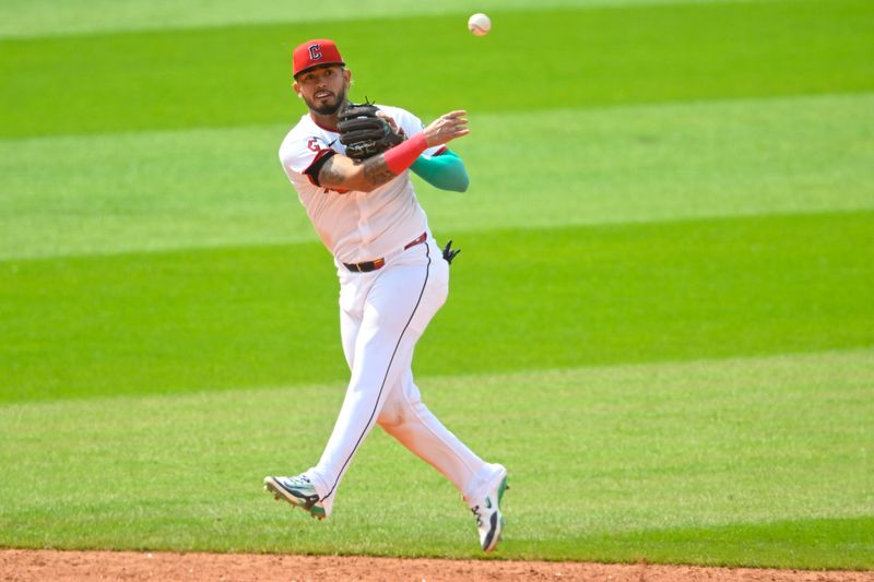 Jun 1, 2025; Cleveland, Ohio, USA; Cleveland Guardians shortstop Gabriel Arias (13) throws to first base in the ninth inning against the Los Angeles Angels at Progressive Field. Mandatory Credit: David Richard-Imagn Images