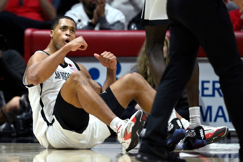 Feb 13, 2024; San Diego, California, USA; San Diego State Aztecs forward Jaedon LeDee (13) celebrates during the second half against the Colorado State Rams at Viejas Arena. Mandatory Credit: Orlando Ramirez-USA TODAY Sports