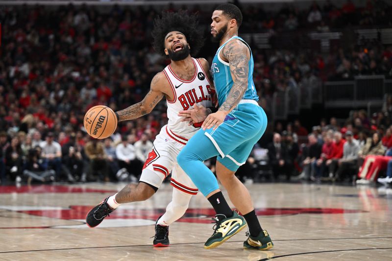 CHICAGO, ILLINOIS - JANUARY 05: Coby White #0 of the Chicago Bulls is fouled by Miles Bridges #0 of the Charlotte Hornets in the first half on January 05, 2024 at United Center in Chicago, Illinois.  NOTE TO USER: User expressly acknowledges and agrees that, by downloading and or using this photograph, User is consenting to the terms and conditions of the Getty Images License Agreement. (Photo by Jamie Sabau/Getty Images)