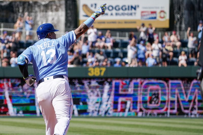 May 27, 2023; Kansas City, Missouri, USA; Kansas City Royals catcher Salvador Perez (13) points toward fans after hitting a solo home run against the Washington Nationals in the third inning at Kauffman Stadium. Mandatory Credit: Denny Medley-USA TODAY Sports