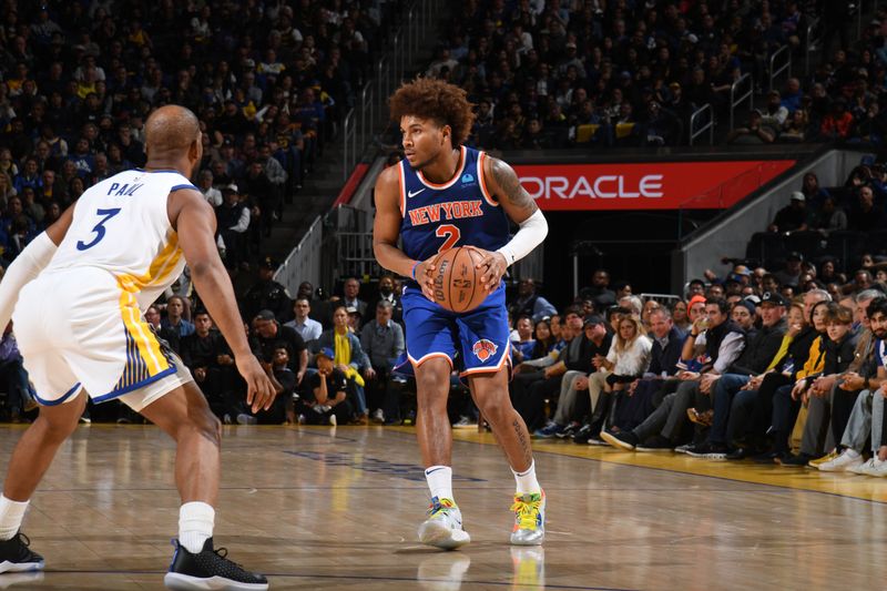 SAN FRANCISCO, CA - MARCH 18: Miles McBride #2 of the New York Knicks handles the ball during the game against the Golden State Warriors on MARCH 18, 2024 at Chase Center in San Francisco, California. NOTE TO USER: User expressly acknowledges and agrees that, by downloading and or using this photograph, user is consenting to the terms and conditions of Getty Images License Agreement. Mandatory Copyright Notice: Copyright 2024 NBAE (Photo by Noah Graham/NBAE via Getty Images)