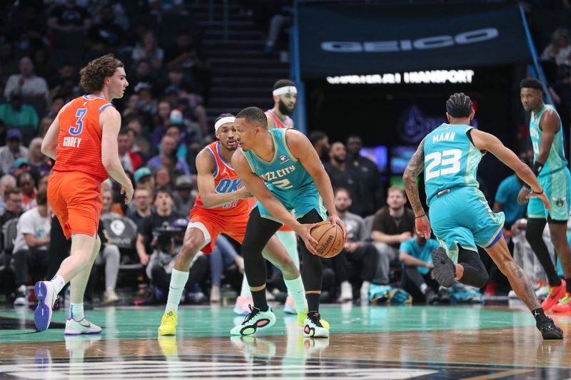 CHARLOTTE, NC - APRIL 7: Grant Williams #2 of the Charlotte Hornets looks to pass the ball during the game against the Oklahoma City Thunder on April 7, 2024 at Spectrum Center in Charlotte, North Carolina. NOTE TO USER: User expressly acknowledges and agrees that, by downloading and or using this photograph, User is consenting to the terms and conditions of the Getty Images License Agreement.  Mandatory Copyright Notice:  Copyright 2024 NBAE (Photo by Brock Williams-Smith/NBAE via Getty Images)