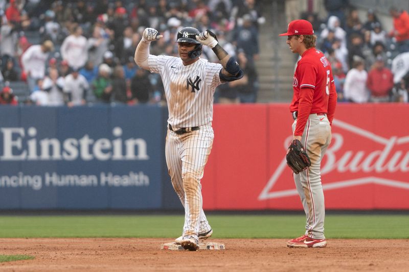 Apr 5, 2023; Bronx, New York, USA;  New York Yankees designated hitter Gleybor Torres (25) reacts to hitting a double against the Philadelphia Phillies during the eighth inning at Yankee Stadium. Mandatory Credit: Gregory Fisher-USA TODAY Sports