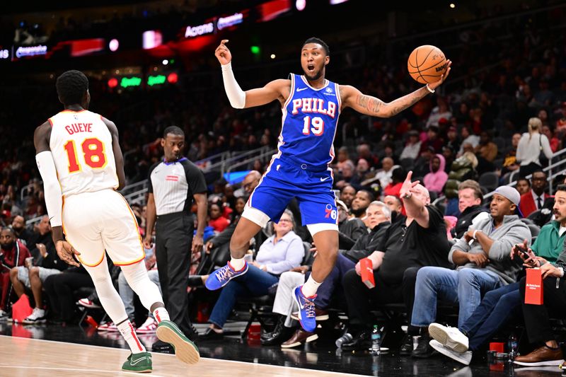 ATLANTA, GA - MARCH 10: Justin Edwards #19 of the Philadelphia 76ers saves loose ball during the game against the Atlanta Hawks on March 10, 2025 at State Farm Arena in Atlanta, Georgia.  NOTE TO USER: User expressly acknowledges and agrees that, by downloading and/or using this Photograph, user is consenting to the terms and conditions of the Getty Images License Agreement. Mandatory Copyright Notice: Copyright 2025 NBAE(Photo by Adam Hagy/NBAE via Getty Images)