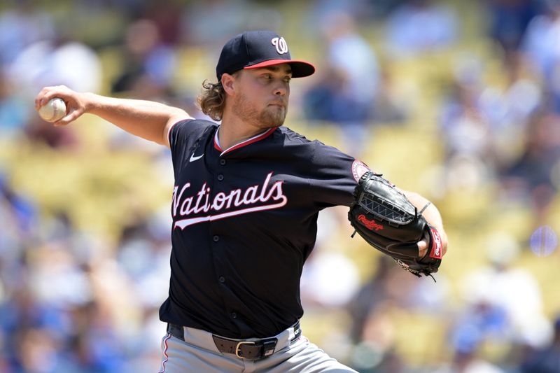 Apr 17, 2024; Los Angeles, California, USA; Washington Nationals pitcher Jake Irvin (27) throws to the plate in the third inning against the Los Angeles Dodgers at Dodger Stadium. Mandatory Credit: Jayne Kamin-Oncea-USA TODAY Sports