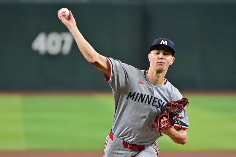 Jun 27, 2024; Phoenix, Arizona, USA;  Minnesota Twins pitcher David Festa (58) throws in the first inning against the Arizona Diamondbacks at Chase Field. Mandatory Credit: Matt Kartozian-USA TODAY Sports