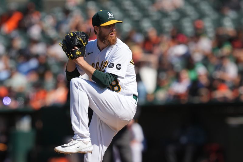 Aug 5, 2023; Oakland, California, USA; Oakland Athletics starting pitcher Paul Blackburn (58) throws a pitch against the San Francisco Giants during the first inning at Oakland-Alameda County Coliseum. Mandatory Credit: Darren Yamashita-USA TODAY Sports