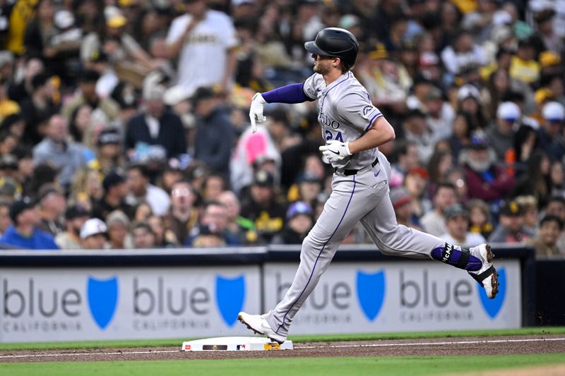 May 13, 2024; San Diego, California, USA; Colorado Rockies third baseman Ryan McMahon (24) rounds the bases after hitting a home run against the San Diego Padres during the fourth inning at Petco Park. Mandatory Credit: Orlando Ramirez-USA TODAY Sports