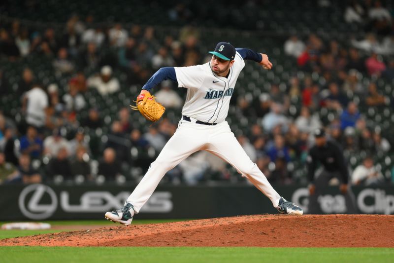 Sep 12, 2024; Seattle, Washington, USA; Seattle Mariners relief pitcher Tayler Saucedo (60) pitches to the Texas Rangers during the eighth inning at T-Mobile Park. Mandatory Credit: Steven Bisig-Imagn Images