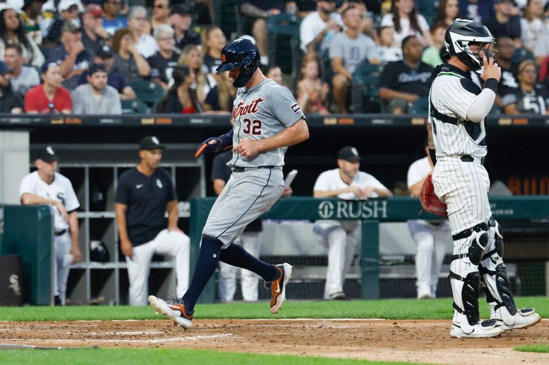 Aug 24, 2024; Chicago, Illinois, USA; Detroit Tigers short stop Ryan Kreidler (32) scores against the Chicago White Sox during the fourth inning at Guaranteed Rate Field. Mandatory Credit: Kamil Krzaczynski-USA TODAY Sports