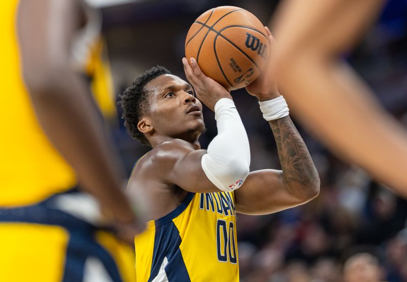 INDIANAPOLIS, INDIANA - NOVEMBER 10: Bennedict Mathurin #00 of the Indiana Pacers shoots a free throw during the game against the New York Knicks at Gainbridge Fieldhouse on November 10, 2024 in Indianapolis, Indiana. NOTE TO USER: User expressly acknowledges and agrees that, by downloading and or using this photograph, User is consenting to the terms and conditions of the Getty Images License Agreement. (Photo by Michael Hickey/Getty Images)