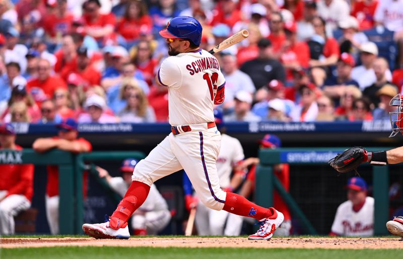 May 7, 2023; Philadelphia, Pennsylvania, USA; Philadelphia Phillies outfielder Kyle Schwarber (12) hits an RBI single against the Boston Red Sox in the fourth inning at Citizens Bank Park. Mandatory Credit: Kyle Ross-USA TODAY Sports