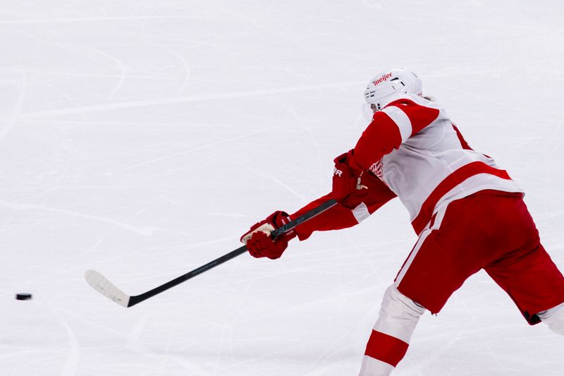 Nov 2, 2025; San Jose, California, USA;  Detroit Red Wings defenseman Moritz Seider (53) shoots and scores a goal against the San Jose Sharks during the third period at SAP Center at San Jose. Mandatory Credit: John Hefti-Imagn Images
