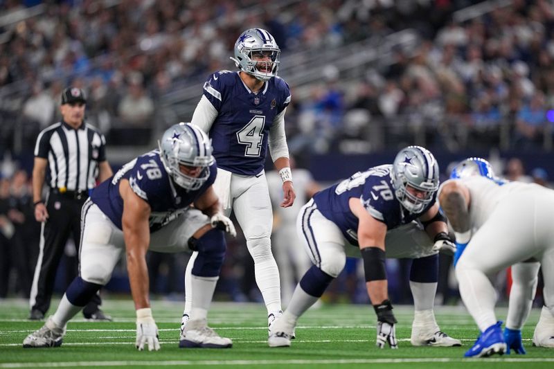 Dallas Cowboys quarterback Dak Prescott (4) waits for the snap against the Detroit Lions during the first half of an NFL football game, Saturday, Dec. 30, 2023, in Arlington, Texas. (AP Photo/Sam Hodde)