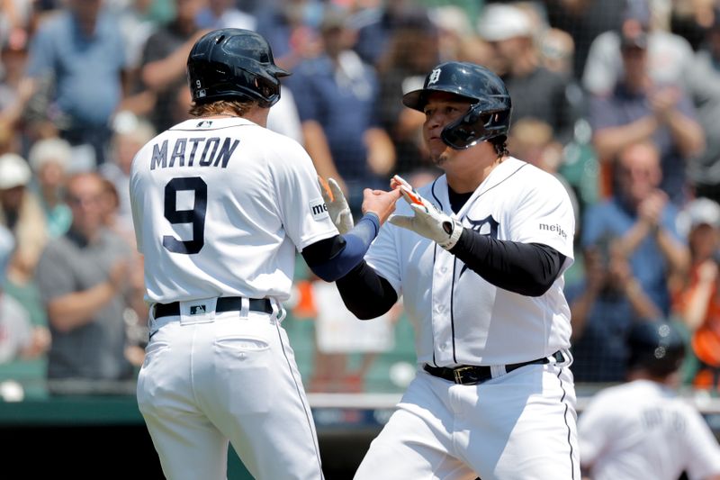 Jun 14, 2023; Detroit, Michigan, USA;  Detroit Tigers designated hitter Miguel Cabrera (24) receives congratulations from third baseman Nick Maton (9)  after he hits a home run in the second inning against the Atlanta Braves at Comerica Park. Mandatory Credit: Rick Osentoski-USA TODAY Sports