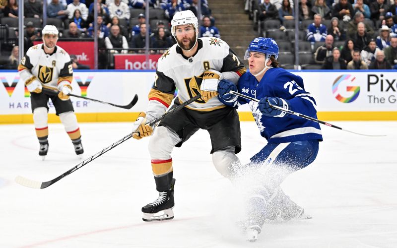 Feb 27, 2024; Toronto, Ontario, CAN;  Vegas Golden Knights defenseman Alex Pietrangelo (7) covers Toronto Maple Leafs forward Matthew Knies (23) in the third period at Scotiabank Arena. Mandatory Credit: Dan Hamilton-USA TODAY Sports