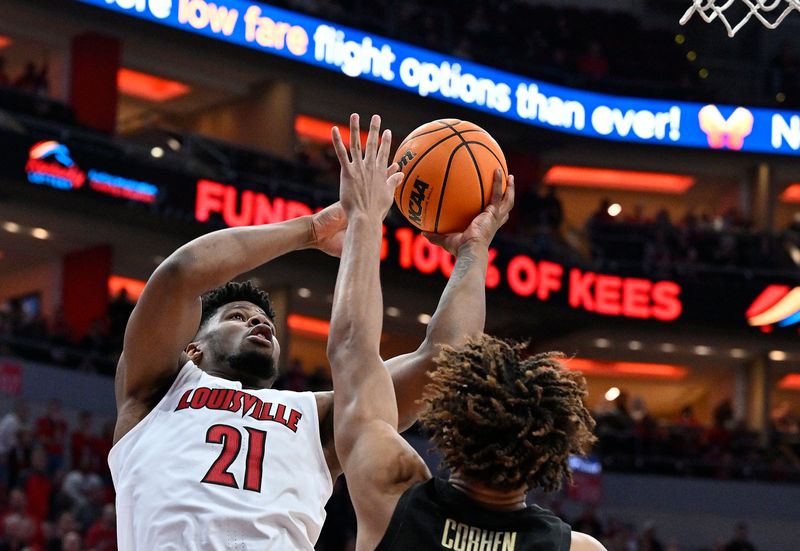 Feb 4, 2023; Louisville, Kentucky, USA;  Louisville Cardinals forward Sydney Curry (21) shoots against Florida State Seminoles forward Cam Corhen (3) during the second half at KFC Yum! Center. Florida State defeated Louisville 81-78. Mandatory Credit: Jamie Rhodes-USA TODAY Sports