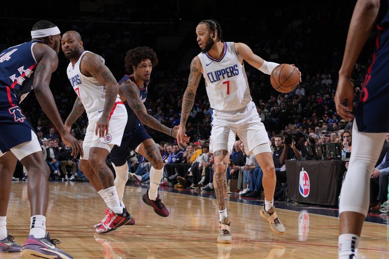 PHILADELPHIA, PA - MARCH 27: Amir Coffey #7 of the LA Clippers dribbles the ball during the game against the Philadelphia 76ers on March 27, 2024 at the Wells Fargo Center in Philadelphia, Pennsylvania NOTE TO USER: User expressly acknowledges and agrees that, by downloading and/or using this Photograph, user is consenting to the terms and conditions of the Getty Images License Agreement. Mandatory Copyright Notice: Copyright 2024 NBAE (Photo by Jesse D. Garrabrant/NBAE via Getty Images)