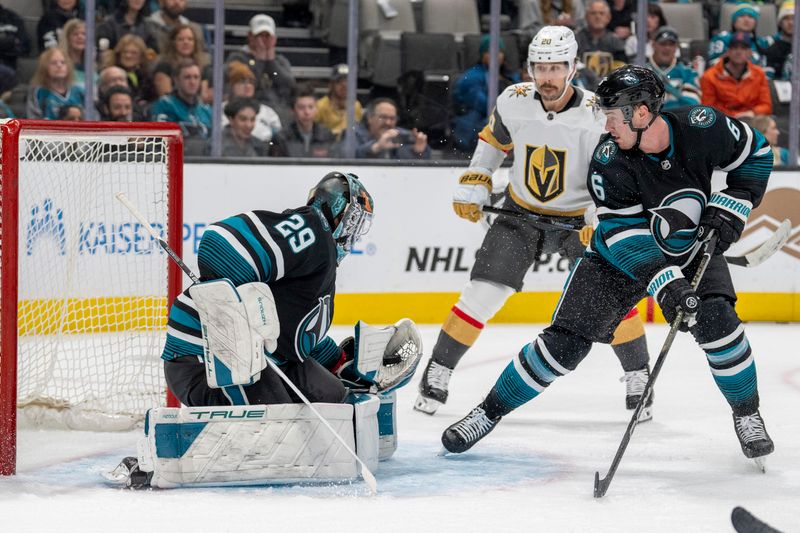 Feb 19, 2024; San Jose, California, USA; San Jose Sharks goalie Mackenzie Blackwood (29) makes a glove save Vegas Golden Knights during the first period at SAP Center at San Jose. Mandatory Credit: Neville E. Guard-USA TODAY Sports