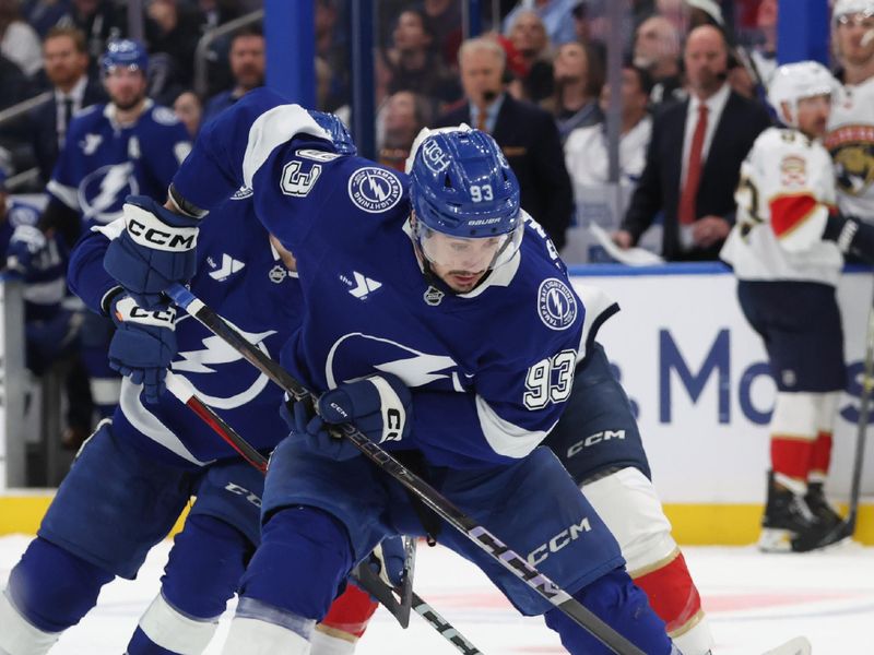 Apr 30, 2025; Tampa, Florida, USA; Tampa Bay Lightning center Gage Goncalves (93) skates with the puck against the Florida Panthers during the third period of game five of the first round of the 2025 Stanley Cup Playoffs at Amalie Arena. Mandatory Credit: Kim Klement Neitzel-Imagn Images