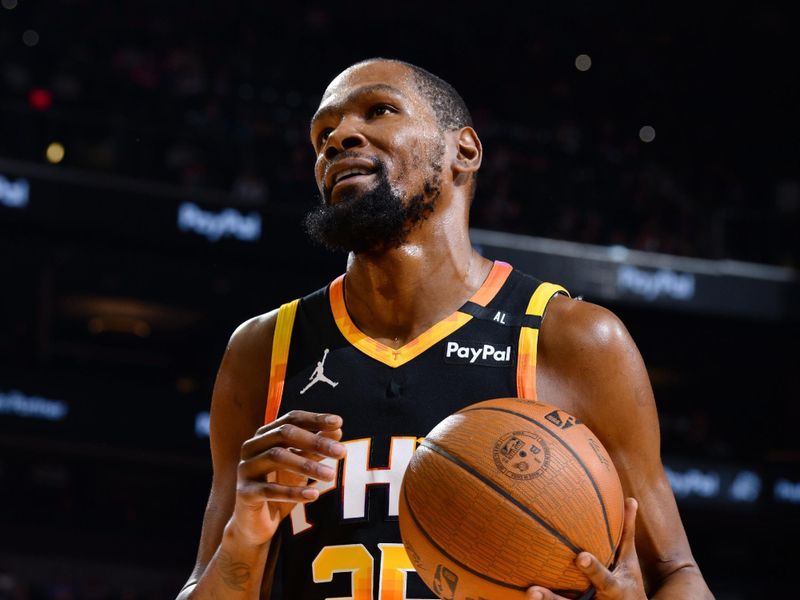 PHOENIX, AZ - DECEMBER 3: Kevin Durant #35 of the Phoenix Suns looks on during the game against the San Antonio Spurs during a Emirates NBA Cup game on December 3, 2024 at Footprint Center in Phoenix, Arizona. NOTE TO USER: User expressly acknowledges and agrees that, by downloading and or using this photograph, user is consenting to the terms and conditions of the Getty Images License Agreement. Mandatory Copyright Notice: Copyright 2024 NBAE (Photo by Barry Gossage/NBAE via Getty Images)