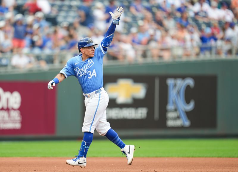 Jul 28, 2024; Kansas City, Missouri, USA; Kansas City Royals catcher Freddy Fermin (34) reacts after hitting a home run during the fourth inning against the Chicago Cubs at Kauffman Stadium. Mandatory Credit: Jay Biggerstaff-USA TODAY Sports