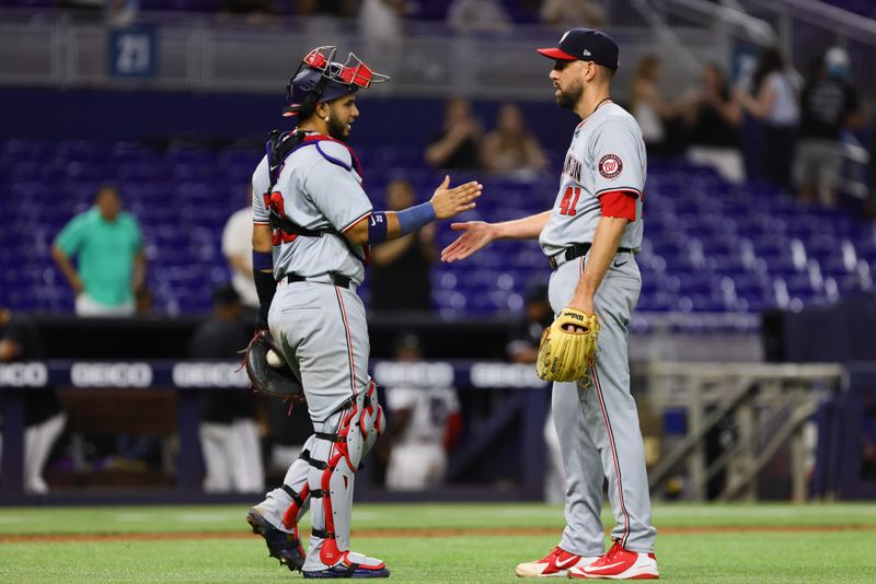 Apr 29, 2024; Miami, Florida, USA; Washington Nationals relief pitcher Matt Barnes (41) celebrates with catcher Keibert Ruiz (20) after the game against the Miami Marlins at loanDepot Park. Mandatory Credit: Sam Navarro-USA TODAY Sports