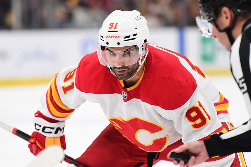 Nov 7, 2024; Boston, Massachusetts, USA;  Calgary Flames center Nazem Kadri (91) prior to a face-off during the second period against the Boston Bruins at TD Garden. Mandatory Credit: Bob DeChiara-Imagn Images