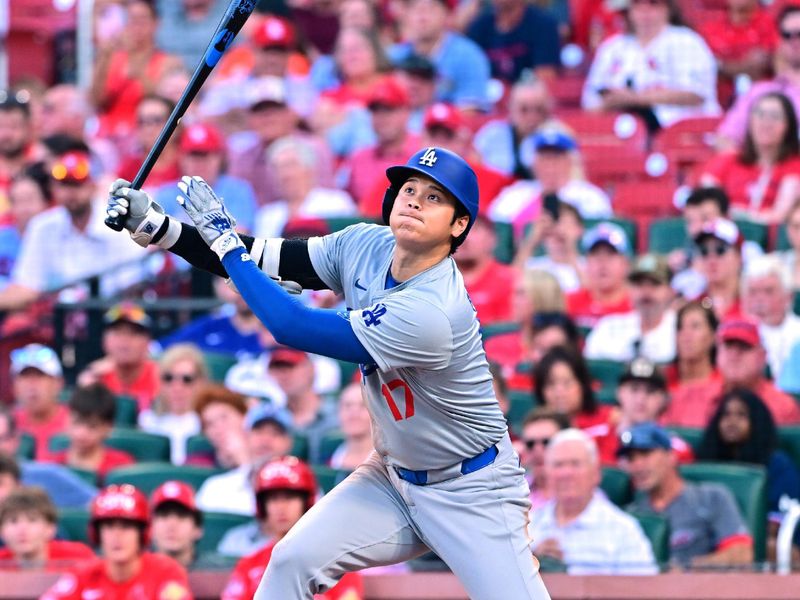 Aug 17, 2024; St. Louis, Missouri, USA; Los Angeles Dodgers designated hitter Shohei Ohtani (17) watches his ball fly out against the St. Louis Cardinals in the second inning at Busch Stadium. Mandatory Credit: Tim Vizer-USA TODAY Sports