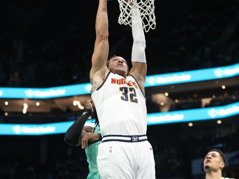 CHARLOTTE, NC - FEBRUARY 1: Aaron Gordon #32 of the Denver Nuggets dunks the ball during the game against the Charlotte Hornets on February 1, 2025 at Spectrum Center in Charlotte, North Carolina. NOTE TO USER: User expressly acknowledges and agrees that, by downloading and or using this photograph, User is consenting to the terms and conditions of the Getty Images License Agreement. Mandatory Copyright Notice: Copyright 2025 NBAE (Photo by Brock Williams-Smith/NBAE via Getty Images)