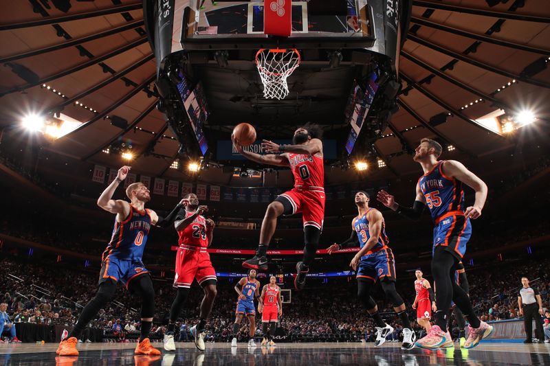 NEW YORK, NY - APRIL 14: Coby White #0 of the Chicago Bulls shoots the ball during the game against the New York Knicks  on April 14, 2024 at Madison Square Garden in New York City, New York.  NOTE TO USER: User expressly acknowledges and agrees that, by downloading and or using this photograph, User is consenting to the terms and conditions of the Getty Images License Agreement. Mandatory Copyright Notice: Copyright 2024 NBAE  (Photo by Nathaniel S. Butler/NBAE via Getty Images)