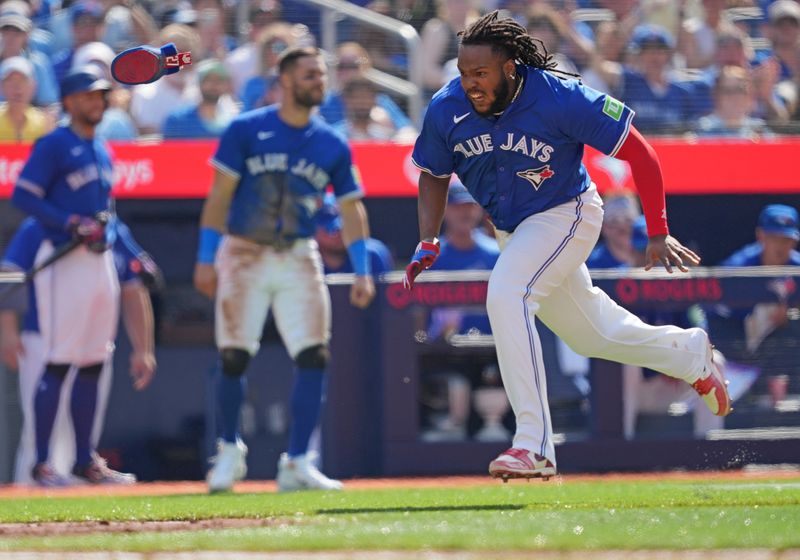 May 20, 2024; Toronto, Ontario, CAN; Toronto Blue Jays first base Vladimir Guerrero Jr. (27) runs for home plate scoring a run against the Chicago White Sox during the sixth inning at Rogers Centre. Mandatory Credit: Nick Turchiaro-USA TODAY Sports