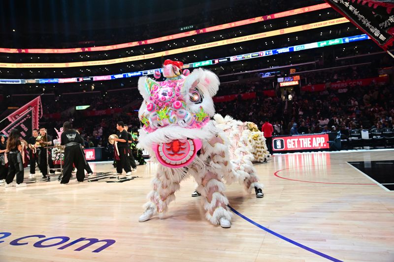 LOS ANGELES, CA - FEBRUARY 7: Yee Ying Tong Dragon & Lion Dance Association performs during halftime to celebrate Lunar New Year and the year of the Dragon on February 7, 2024 at Crypto.Com Arena in Los Angeles, California. NOTE TO USER: User expressly acknowledges and agrees that, by downloading and/or using this Photograph, user is consenting to the terms and conditions of the Getty Images License Agreement. Mandatory Copyright Notice: Copyright 2024 NBAE (Photo by Adam Pantozzi/NBAE via Getty Images)