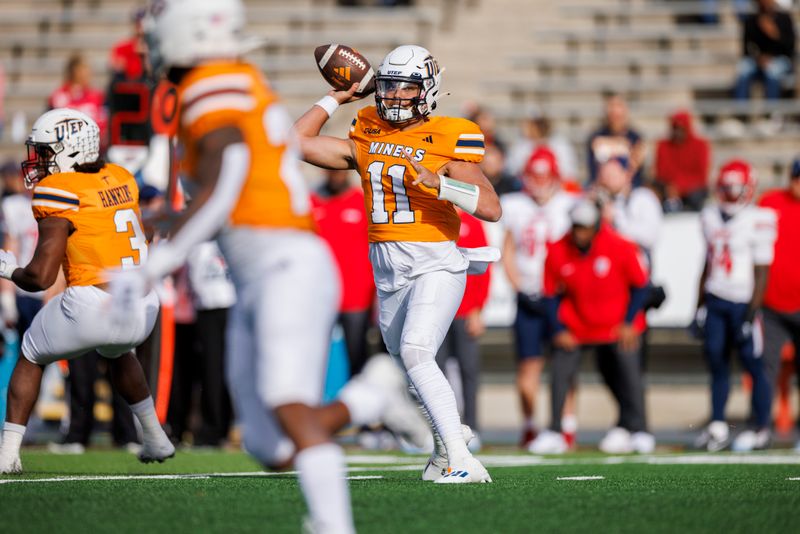 Nov 25, 2023; El Paso, Texas, USA; UTEP Miners quarterback Cade McConnell (11) drops back to pass the ball against No. 22 Liberty Flames defense during the first half at Sun Bowl Stadium. Mandatory Credit: Ivan Pierre Aguirre-USA TODAY Sports