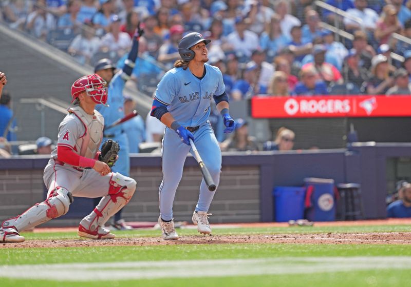 Aug 25, 2024; Toronto, Ontario, CAN; Toronto Blue Jays right fielder Addison Barger (47) reacts after hitting a two run home run against the Los Angeles Angels during the sixth inning at Rogers Centre. Mandatory Credit: Nick Turchiaro-USA TODAY Sports