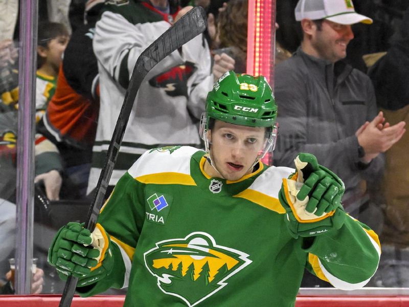 Nov 29, 2024; Saint Paul, Minnesota, USA;  Minnesota Wild forward Marco Rossi (23) celebrates his goal against the Chicago Blackhawks during the second period at Xcel Energy Center. Mandatory Credit: Nick Wosika-Imagn Images