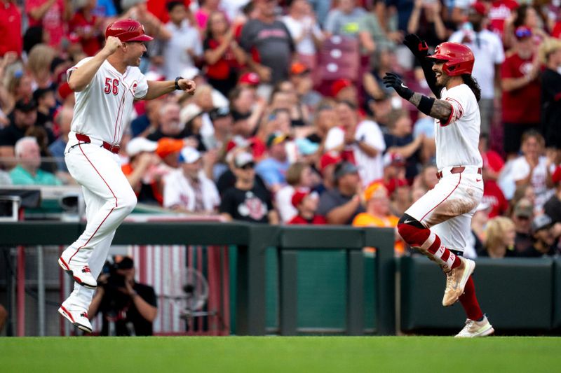 Aug 3, 2024; Cincinnati, Ohio, USA; Cincinnati Reds second base Jonathan India (6) celebrates with third base coach J.R. House (56) after hitting a solo home run against the San Francisco Giants in the third inning at Great American Ball Park. Mandatory Credit: Albert Cesare-USA TODAY Sports