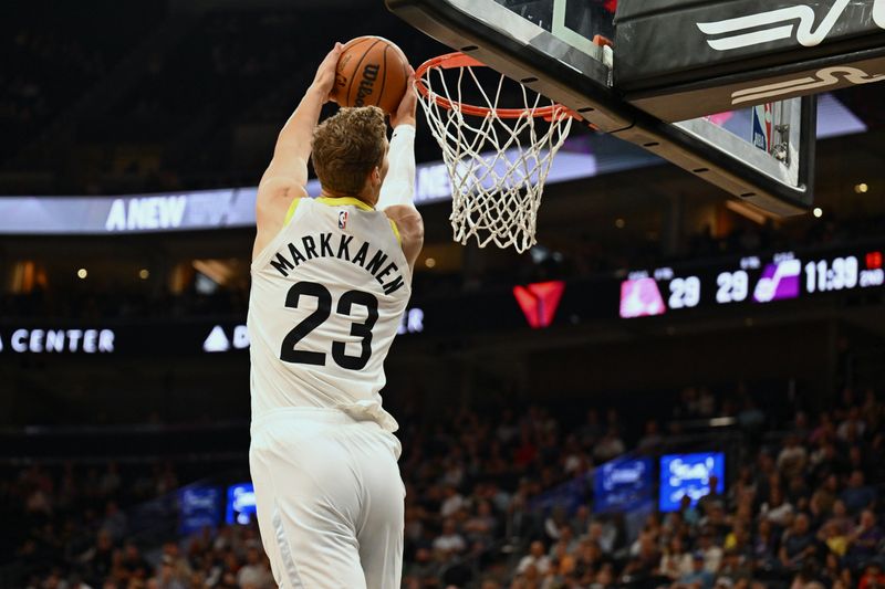 SALT LAKE CITY, UTAH - OCTOBER 04:  Lauri Markkanen #23 of the Utah Jazz finishes off an alley-oop with a dunk in the first half against the New Zealand Breakers on October 04, 2024 at Delta Center in Salt Lake City, Utah.   NOTE TO USER: User expressly acknowledges and agrees that, by downloading and or using this photograph, User is consenting to the terms and conditions of the Getty Images License Agreement.  (Photo by Jamie Sabau/Getty Images)