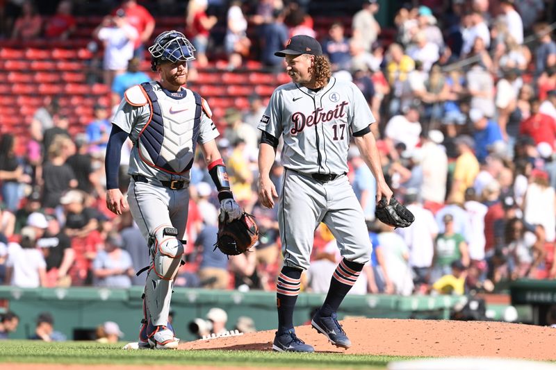 Jun 2, 2024; Boston, Massachusetts, USA;  Detroit Tigers pitcher Andrew Chafin (17) and catcher Carson Kelly (15) celebrate beating the Boston Red Sox in the tenth inning at Fenway Park. Mandatory Credit: Eric Canha-USA TODAY Sports