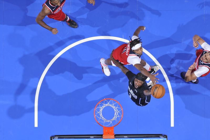 ORLANDO, FL - NOVMEBER 10: Kentavious Caldwell-Pope #3 of the Orlando Magic drives to the basket during the game against the Washington Wizards on November 10, 2024 at Kia Center in Orlando, Florida. NOTE TO USER: User expressly acknowledges and agrees that, by downloading and or using this photograph, User is consenting to the terms and conditions of the Getty Images License Agreement. Mandatory Copyright Notice: Copyright 2024 NBAE (Photo by Fernando Medina/NBAE via Getty Images)