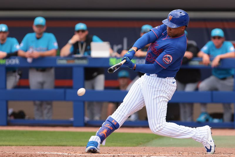 Feb 21, 2026; Port St. Lucie, Florida, USA; New York Mets left fielder Juan Soto (22) hits against Miami Marlins during the fourth inning at Clover Park. Mandatory Credit: Sam Navarro-Imagn Images