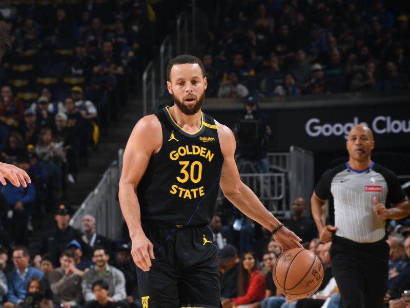 SAN FRANCISCO, CA - FEBRUARY 3: Stephen Curry #30 of the Golden State Warriors dribbles the ball during the game against the Orlando Magic on February 3, 2025 at Chase Center in San Francisco, California. NOTE TO USER: User expressly acknowledges and agrees that, by downloading and or using this photograph, user is consenting to the terms and conditions of Getty Images License Agreement. Mandatory Copyright Notice: Copyright 2025 NBAE (Photo by Noah Graham/NBAE via Getty Images)